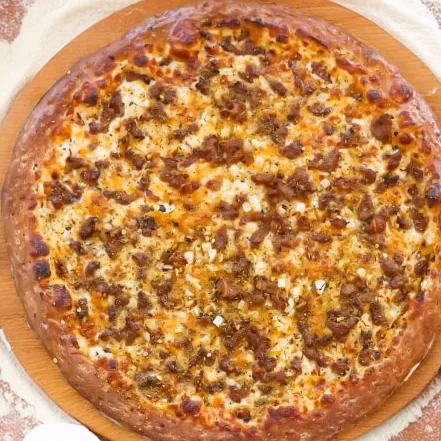The Pub Pizza with Italian sausage and onions